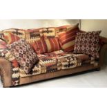 KELIM STYLE SOFA, 240cm W, studded with rounded arms and loose cushions. (5)