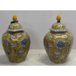 TEMPLE JARS WITH COVERS, a pair, foliate decorated, 37cm H. (2)