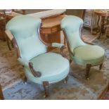 A COMPANION PAIR OF CHAIRS, Victorian walnut, circa 1870, with carved showframes and eau de nil