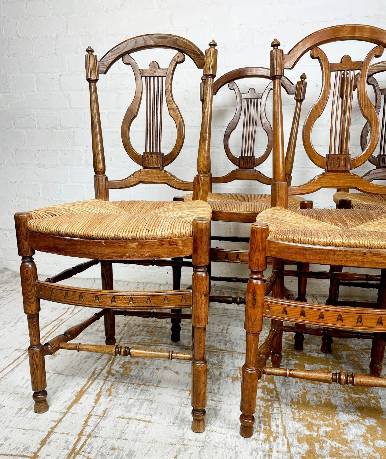 DINING CHAIRS, six, late 19th century French Provincial ash with lyre backs and rush seats. (6) - Image 3 of 3