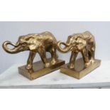 CONTEMPORARY SCHOOL, a pair of sculptural elephants, gilt finish, 38cm H. (2)