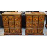 CHEST OF DRAWERS, a pair, 63cm x 32cm x 74cm, Indian gilt metal repoussé on mango wood. (2)