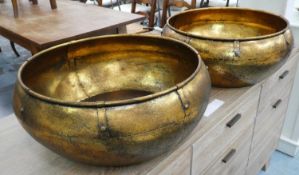 VESSELS, a pair, gilt metal, 52cm diam x 20cm H approx. (2)