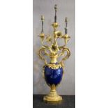 TABLE LAMP, 61cm H, late 19th/early 20th century French blue ceramic, gilt bronze and brass mounted.
