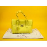 FERRAGAMO BAG, yellow leather with powder pink leather lining, two top handles, front flap closure