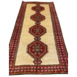 ANTIQUE SHIRAZ RUG, 258cm x 133cm.