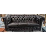 CHESTERFIELD SOFA, 199cm W, black leather on castors.