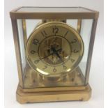 JAGER-LECOULTRE ATMOS CLOCK, serial no. 8237, 1940's, 24cm H x 21cm x 16cm.