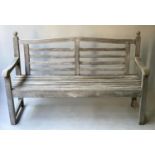 GARDEN ESTATE BENCH, weathered teak and slatted with finials, 150cm W.