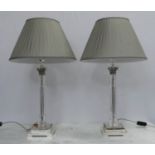 CHRISTOPHER HYDE TABLE LAMPS, a pair, 69cm H each including shade, glass classical columns. (2)