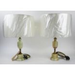 TABLE LAMPS, a pair, gilt metal and onyx, with shades, 51cm H. (2)