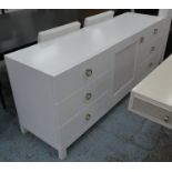 DUCDUC SIDEBOARD, 183cm L x 75cm H x 53cm D white with a central door and six drawers.