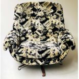 REVOLVING ARMCHAIR, 1970's printed cut velvet revolving on five star base, 97cm W.