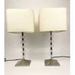 TABLE LAMPS, a pair, contemporary polished metal and lucite, with shades, 55cm H. (2)