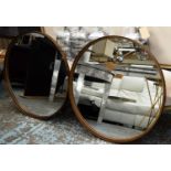 WALL MIRRORS, two 83.5cm diam., 1960's French style gilt frames. (2)