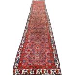 ANTIQUE PERSIAN FEREGHAN RUNNER, 485cm x 81cm.