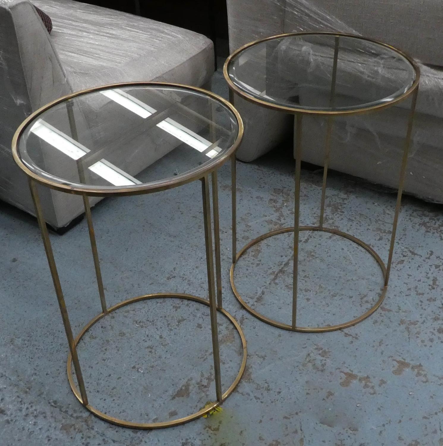 SIDE TABLES, two, 66cm x 46.5cm Diam, 1960's French style, gilt metal and glass. (2)