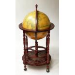 GLOBE COCKTAIL CABINET, in the form of an antique terrestrial globe on stand with rising lid and