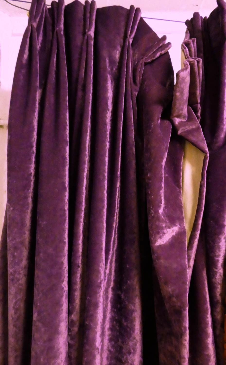 CURTAINS, a pair, 93cm gathered x 250cm drop approx., purple velvet, lined and interlined. (2)