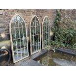 GARDEN WALL MIRRORS, a set of three, Gothic style, metal frames, 158cm x 66.5cm. (3)