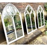 ARCHITECTURAL GARDEN WALL MIRRORS, three, 103cm x 54cm, white painted Gothic revival style. (3)