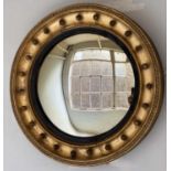 CONVEX WALL MIRROR, 58cm diam, 19th century giltwood, with moulded sphere encrusted frame,