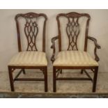 DINING CHAIRS, a set of twelve, Chippendale style, including two armchairs with cream damask