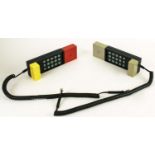 ENORME TELEPHONES BY ETTORE SOTTSASS AND DAVID KELLY, two, differing colours, in original packaging,