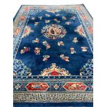 ANTIQUE CHINESE PEKING DRAGON CARPET, 295cm x 220cm.