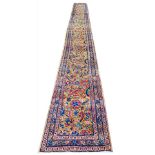 ANTIQUE KERMAN LAVER RUNNER, 510cm x 60cm.