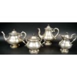 TEA AND COFFEE SERVICE, four piece, 19th Century Portuguese silver, stamped 'Aurificia', approx.