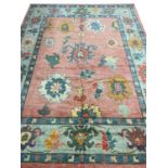 FINE CONTEMPORARY OUSHAK CARPET, 340cm x 255cm.