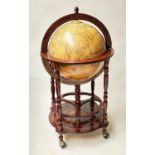 GLOBE COCKTAIL CABINET, in the form of an antique terrestrial globe on stand with rising lid and