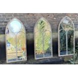 ARCHITECTURAL GARDEN MIRRORS, three, 122cm x 56cm, Gothic revival style, aged metal frames. (3)