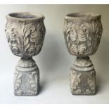 GARDEN PLANTERS, a pair, 41cm W x 90cm H, weathered reconstituted stone, leaf moulded on stands. (2)