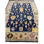 FINE CONTEMPORARY OUSHAK CARPET, 273cm x 190cm.