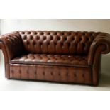 CHESTERFIELD SOFA, hand dyed leaf brown antique buttoned leather with deeply curved back and arms,