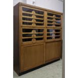 HABERDASHERY CABINET, mid 20th century oak 174cm x 189cm H x 47cm, labeled 'Bennett & Jennison