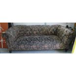 CHESTERFIELD SOFA, 215cm W approx., Victorian mahogany, in later upholstery, with drop end.