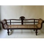 ANGLO INDIAN SOFA, mid 19th century North Indian teak with carved reeded scroll arms, cane