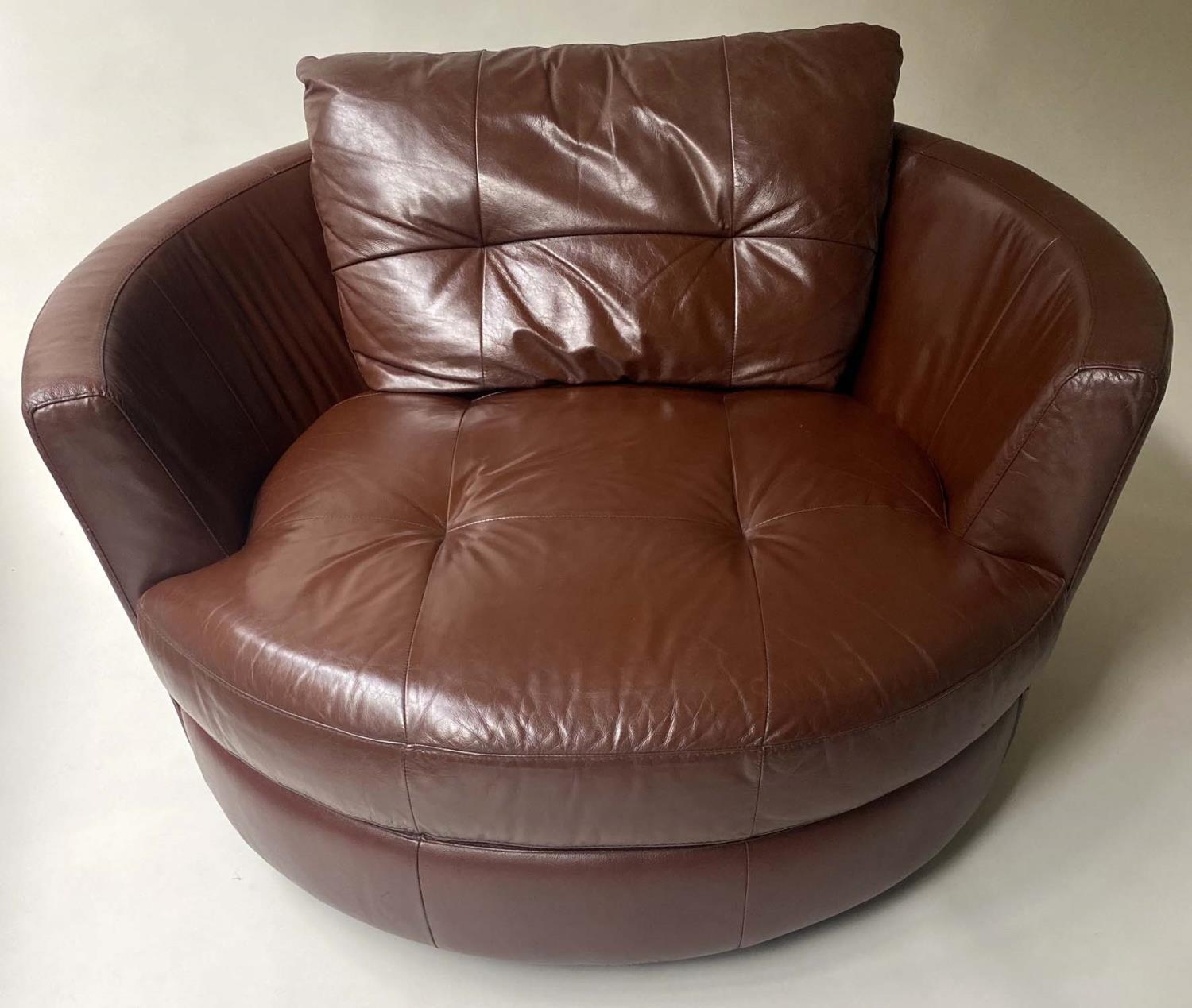 EASY REVOLVING ARMCHAIR, oversized grained tan leather, 132cm W. - Image 2 of 5