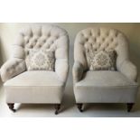 ARMCHAIRS, a pair, early 20th century Howard style buttoned ticking fabric upholstered with turned