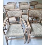 DINING ARCHAIRS, a set of eight, rattan framed, cane panelled and leather bound. (8)