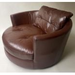 EASY REVOLVING ARMCHAIR, oversized grained tan leather, 132cm W.