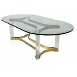 LOW TABLE, 1970's lucite and brass with a rounded glass top, 42cm H x 135cm x 70cm.