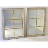 ARCHITECTURAL WALL MIRRORS, a pair, 114cm x 78cm, aged white painted finish with gilt accents. (2)
