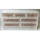 FAUX BAMBOO LOW CHEST, with three short and four long cane panelled drawers, 145cm x 46cm x 77cm H.
