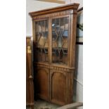 CORNER CABINET, 110cm x 197cm H, George IV oak with carved and inlaid detail in two parts with