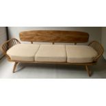 ERCOL 'SURFBOARD' SOFA, elm and beech slatted with seat cushions and surfboard back, 205cm W.