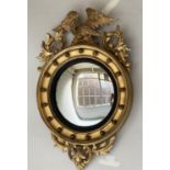 CONVEX WALL MIRROR, 19th century giltwood with circular ball encrusted frame, convex plate, ebonised